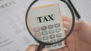 injury victim calculating taxes that they might have to pay for their personal injury settlement